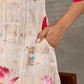 Pichwai-inspired off white lotus print dress with pink accents.