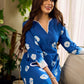 Refreshing cobalt blue shibori tie-dye dress with ivory accents and delicate lace-trimmed neckline.