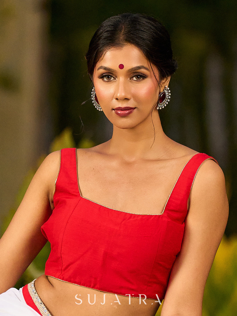 Artisanal White Georgette Saree with Red Embroidered Motifs & Beaded Border Trim