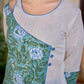 Breezy White Cotton Kurta with Green Floral Hand Block Print Asymmetric Panel and Cold Shoulder Accent