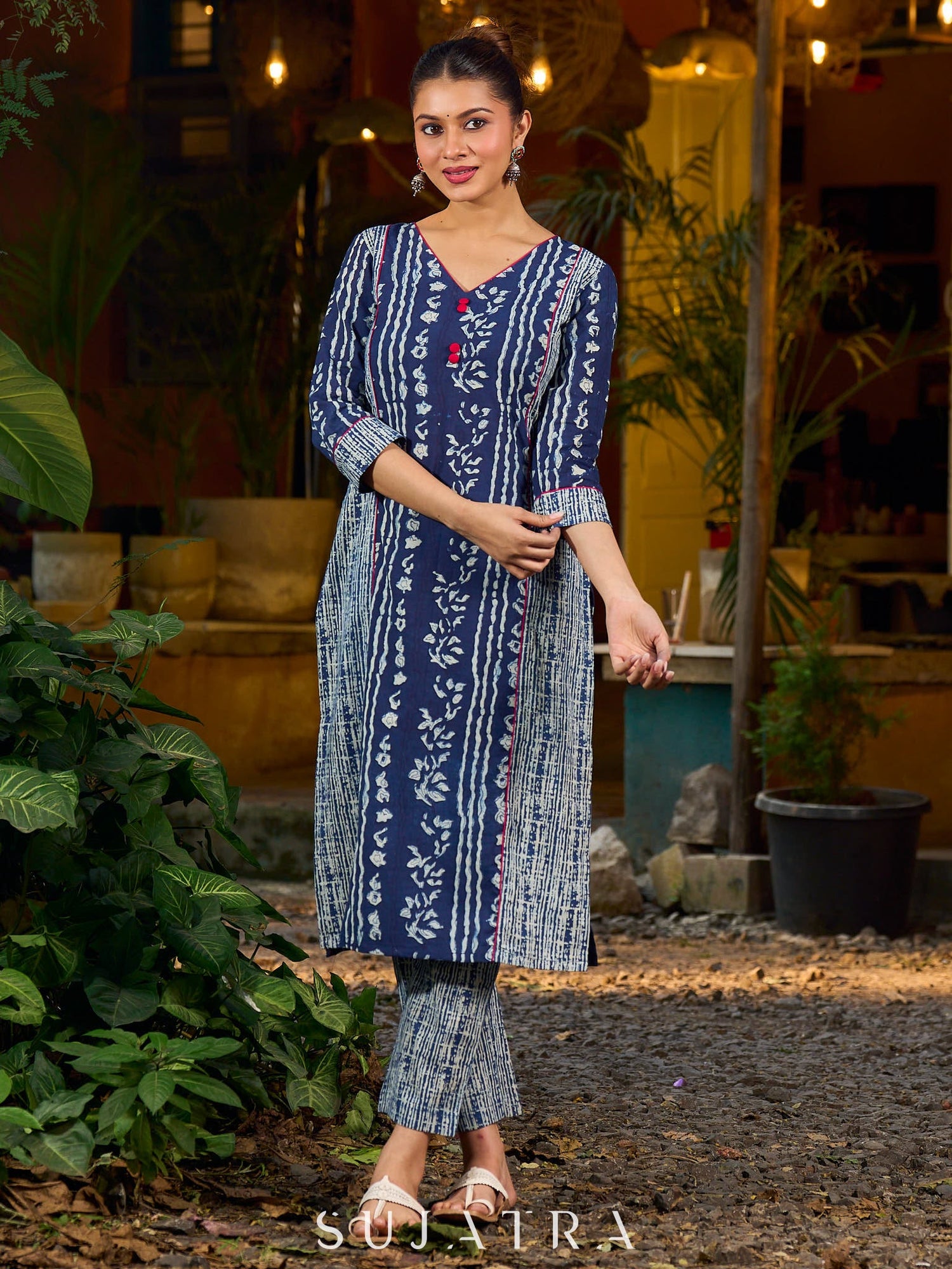 Indigo kurta elevated with delicate pink piping and buttons
