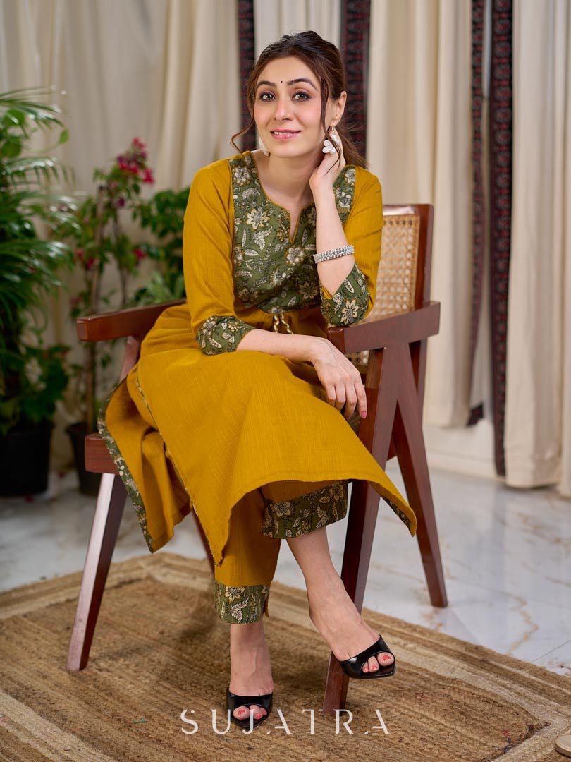 Vibrant Mustard Cotton Kurta with Olive Floral Print Yoke and Statement Tassel Embellishment