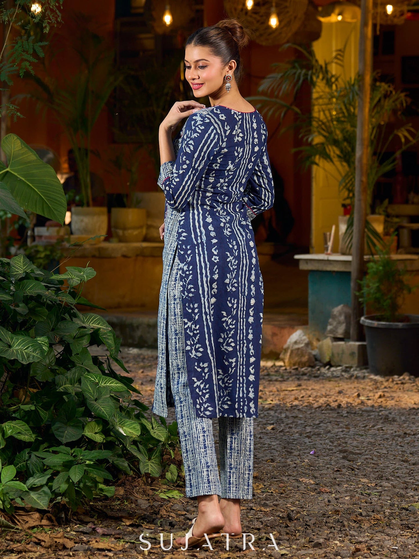 Indigo kurta elevated with delicate pink piping and buttons