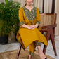Vibrant Mustard Cotton Kurta with Olive Floral Print Yoke and Statement Tassel Embellishment