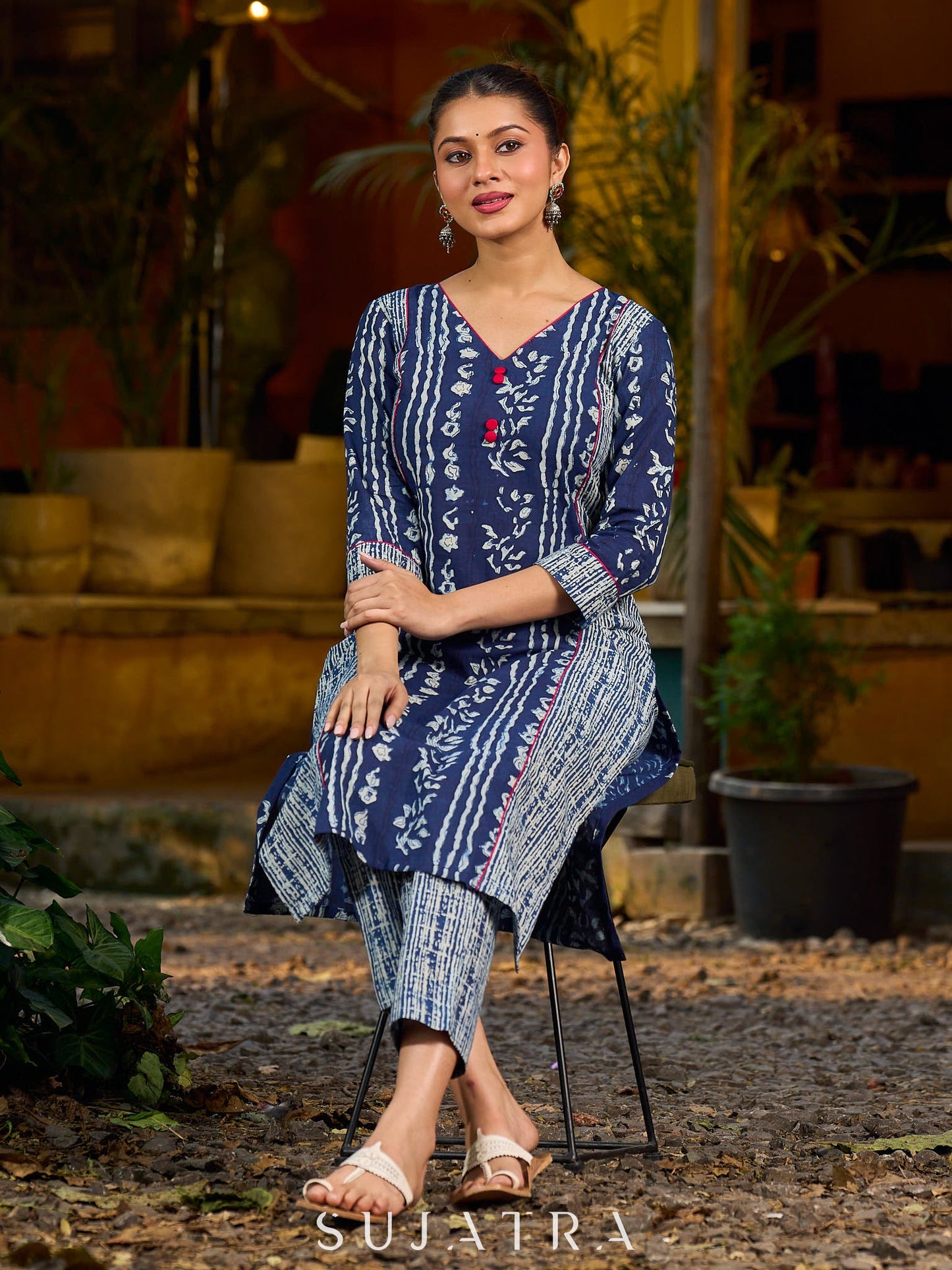 Indigo kurta elevated with delicate pink piping and buttons