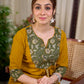 Vibrant Mustard Cotton Kurta with Olive Floral Print Yoke and Statement Tassel Embellishment