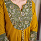 Vibrant Mustard Cotton Kurta with Olive Floral Print Yoke and Statement Tassel Embellishment