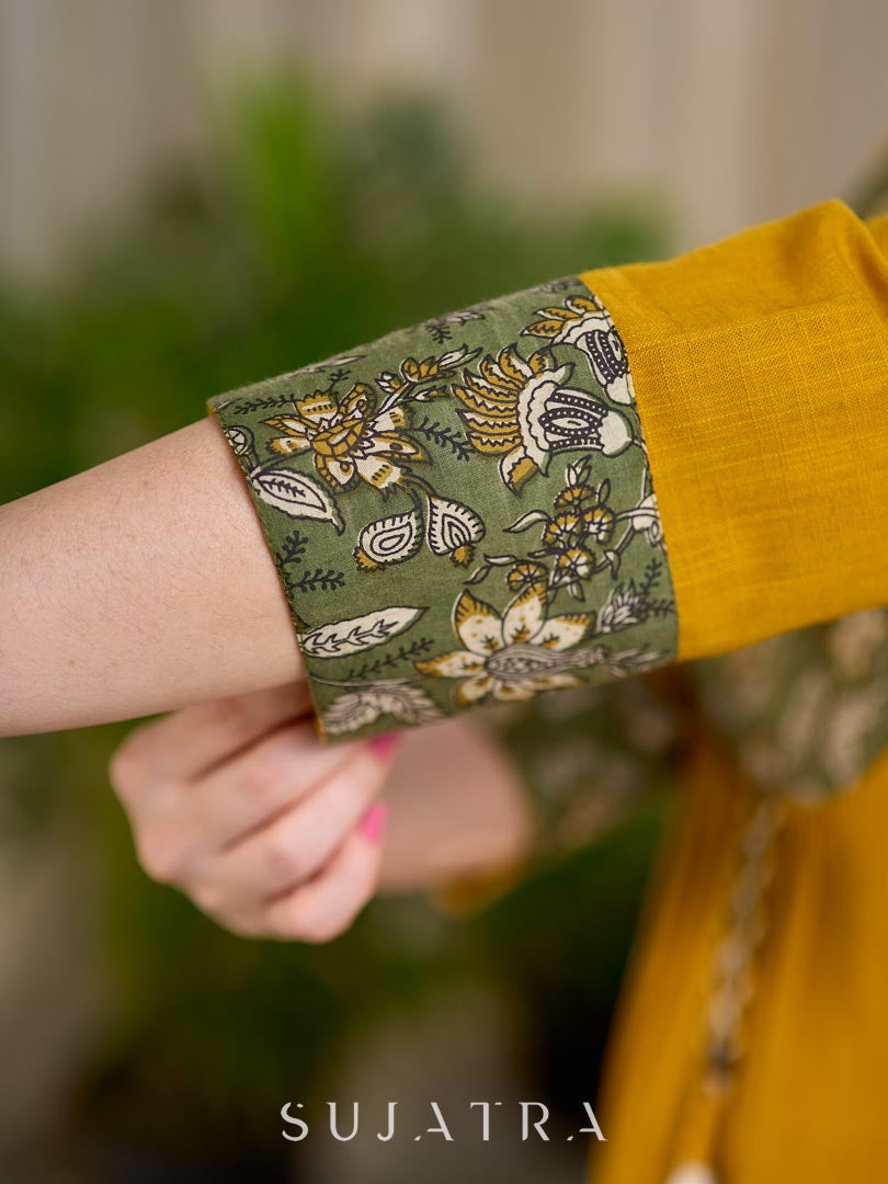 Vibrant Mustard Cotton Kurta with Olive Floral Print Yoke and Statement Tassel Embellishment
