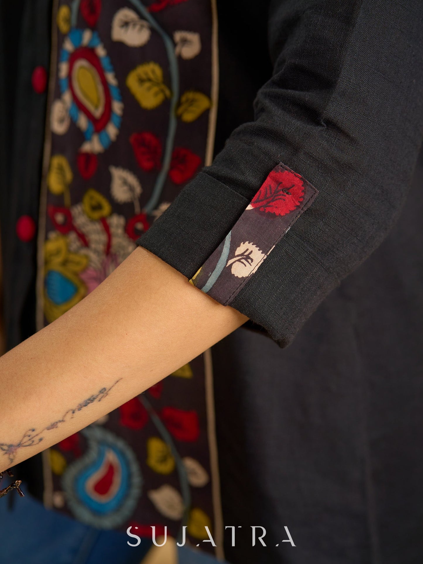 Traditional hand kalamkari designs on contrasting black cotton giving a  classic style - Pant optional