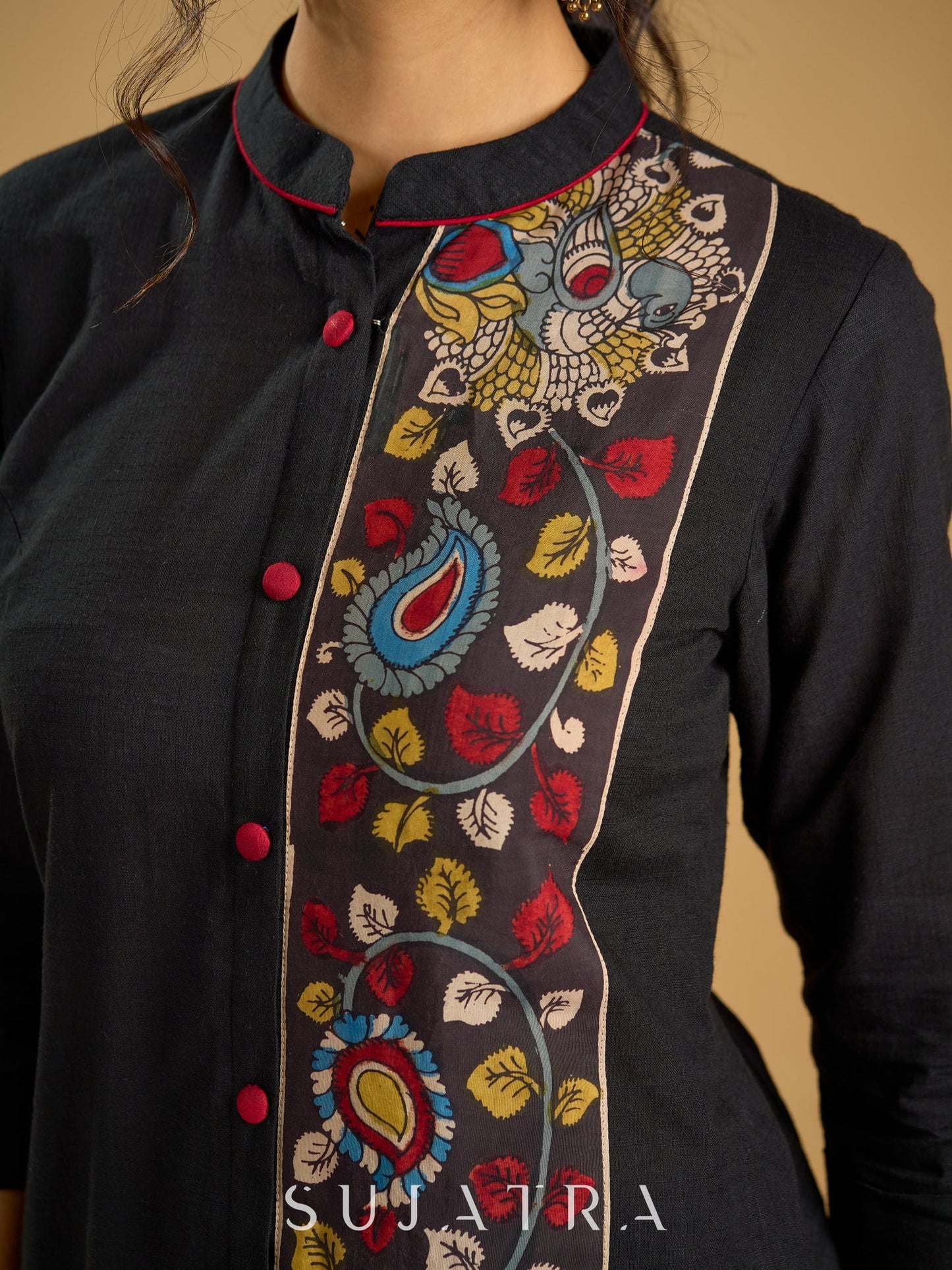 Traditional hand kalamkari designs on contrasting black cotton giving a  classic style - Pant optional