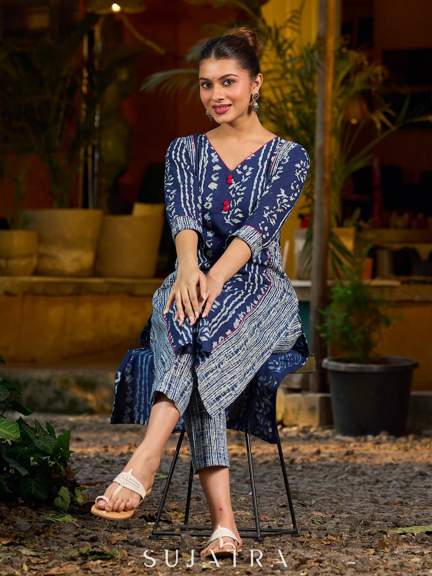 Indigo kurta elevated with delicate pink piping and buttons