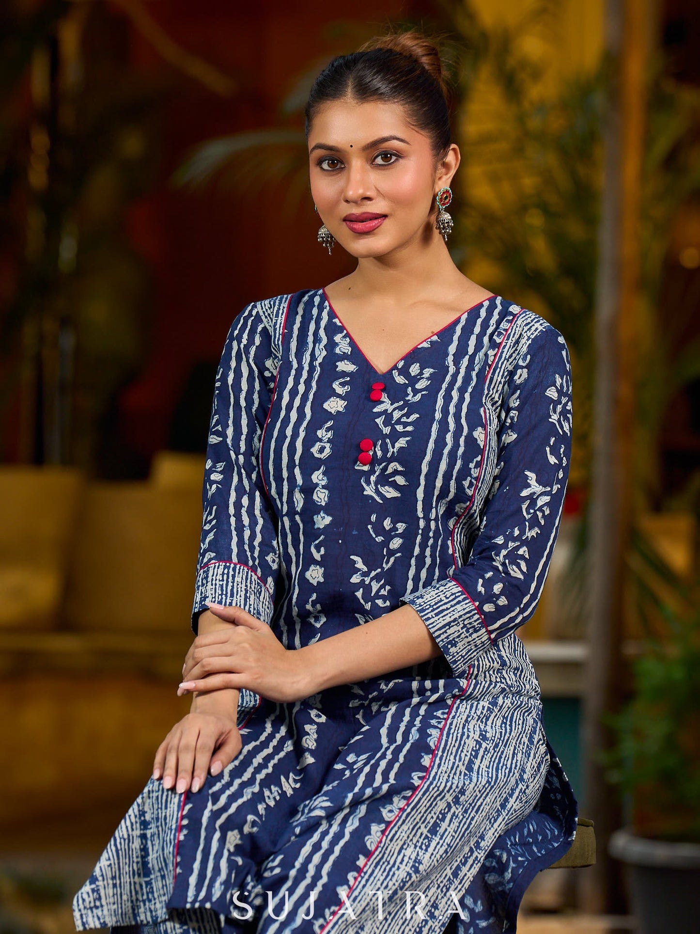 Indigo kurta elevated with delicate pink piping and buttons