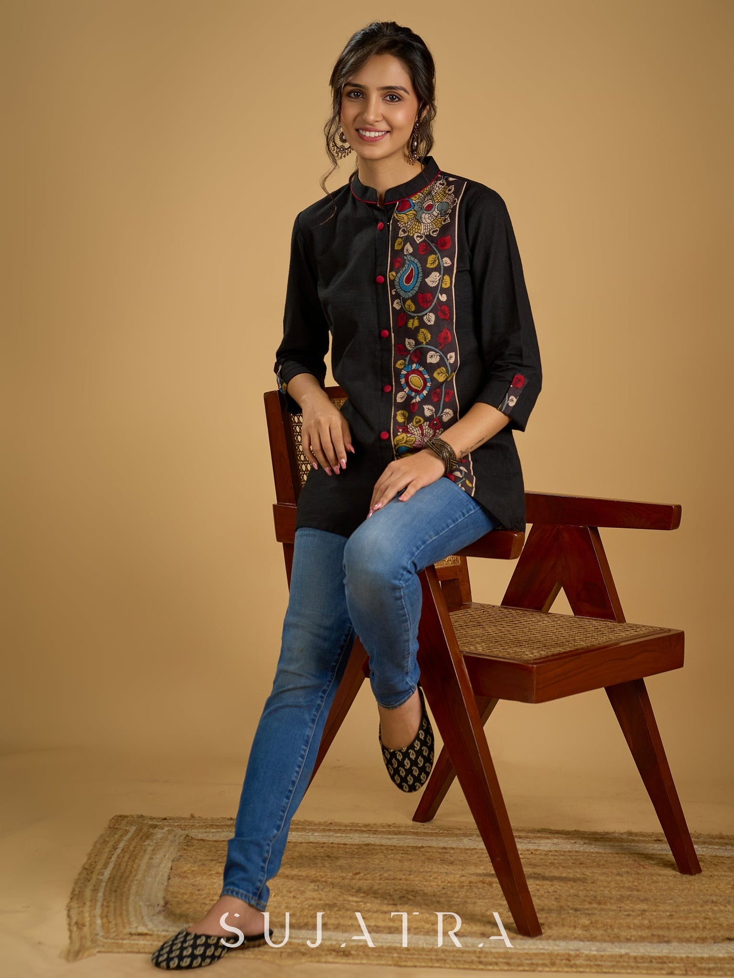 Traditional hand kalamkari designs on contrasting black cotton giving a  classic style - Pant optional