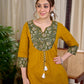 Vibrant Mustard Cotton Kurta with Olive Floral Print Yoke and Statement Tassel Embellishment