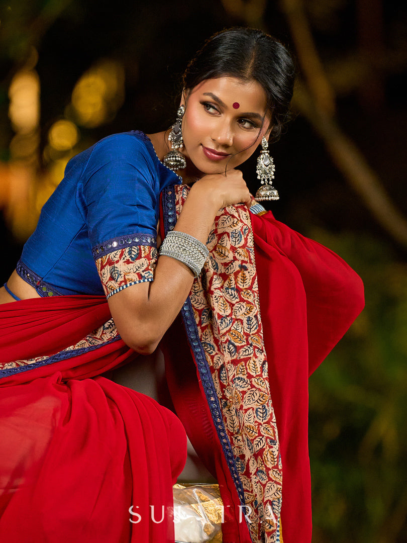 Poised Red Georgette Saree with Kalamkari & Indigo Border Highlighted with Mirror Lace Trim