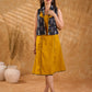 Tailored black Kantha jacket featuring fish motifs, a mustard pintuck patch, and a flipped collar, offering a structured silhouette with refined detail and distinctive, contemporary character.