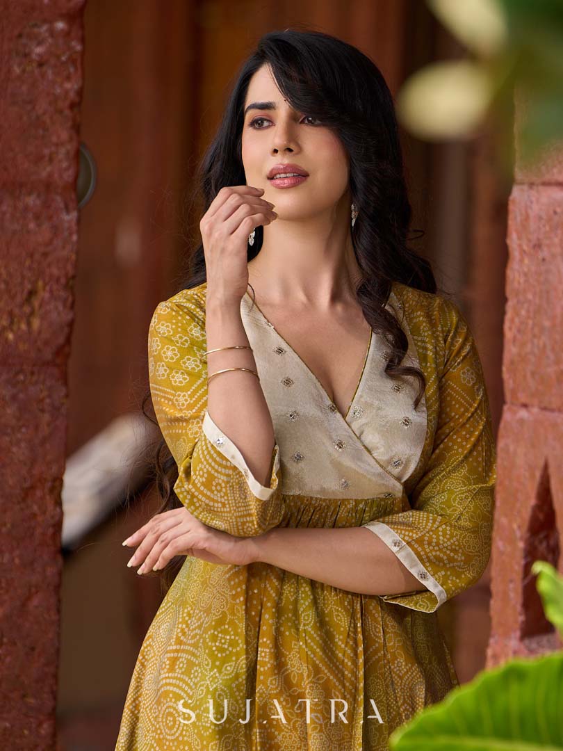 Exquisite yellow Bandhani printed kurta with a delicate off-white tissue overlay and refined accents.