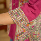 Madhubani print add charm to this magenta cotton top.