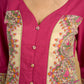Madhubani print add charm to this magenta cotton top.