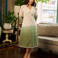 Serene ivory and sage green ombré overlap hakoba dress with olive button accents.