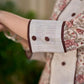 Cream Floral Hand Block Print Mul Cotton Kurta with Handwoven Ivory Center Panel and Brown Button Detail