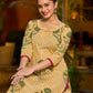 Handcrafted mustard kurta with stripe–floral print and magenta accents.