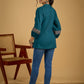 Elegant cotton teal top featuring graceful and unique detailing.