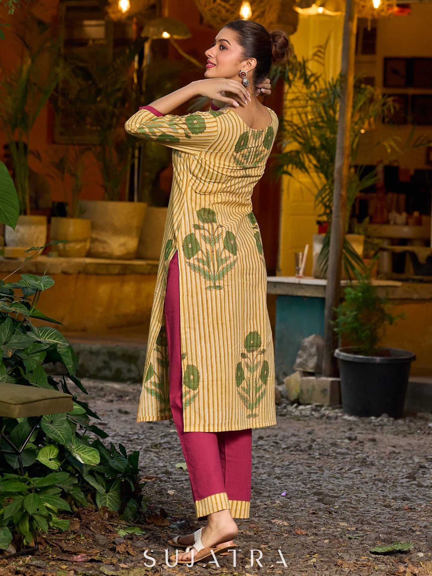 Handcrafted mustard kurta with stripe–floral print and magenta accents.