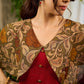 Elegant maroon dress featuring an attached artisan Kalamkari shoulder cape.