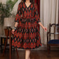 Black multicolor ikat gathered dress highlighted with velvet stone lace
