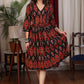 Black multicolor ikat gathered dress highlighted with velvet stone lace