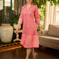 Peach and red block print stripe-floral shirt dress with fusion hand block printed stripes and jaal, a notch collar, and coordinated red accents for a vibrant, contemporary look.