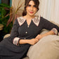 Timeless black stripes accented with exquisite hand-painted Madhubani on collars and cuffs