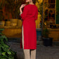 Elegant red kurta featuring a V-shaped striped neck panel