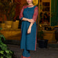 Teal kurta with contrasting Ajrakh sleeves and a chic neck cut