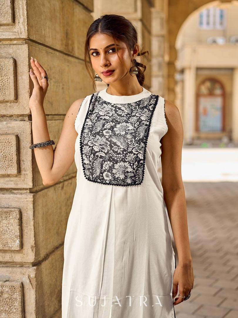 Elegant Off-White Rayon Sleeveless Kurta with Contrast Black Floral Embroidered Yoke Panel
