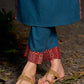 Teal kurta with contrasting Ajrakh sleeves and a chic neck cut