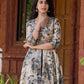 Elegant black–white floral kurta featuring a graceful bias silhouette, intricate mirror embroidery on the neck and sleeves, and a sweetheart neckline.