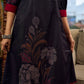 Elegant black Kalamkari-inspired dress with deep maroon accents and graceful floral motifs.