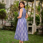 Graceful powder blue Ikat dress showcasing layered overlap details highlighted with white accents.