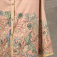 Peach Kalamkari-inspired shirt dress with soft beige accents.