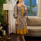 Heritage Kalamkari dress with elegant mustard accents and black pearl embellishments.