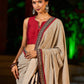 Striking Beige Kalamkari Print Saree with Striped Border & Mythological Motifs and Ajrakh Border Trim