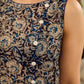Stunning black Kalamkari overlap dress featuring a chic asymmetrical gathered hem.