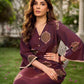 Elegant wine-purple Ikat dress with flowy sleeves, finished with a belt for a softly cinched silhouette.