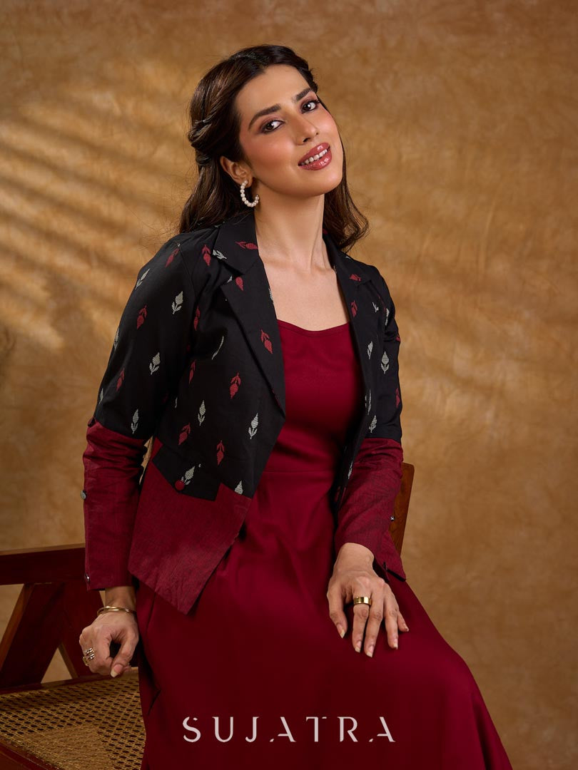 Sharp black and maroon half-and-half Jamdani jacket with functional flap pockets, offering a structured silhouette with bold contrast and refined detailing for elevated corporate styling.