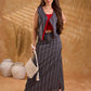 Textured grey Jamdani sleeveless waistcoat with bold red accents and an asymmetrical opening, creating a sharp, modern silhouette with distinctive, fashion-forward appeal.