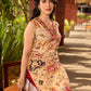 Graceful cream all-over printed kurta adorned with an overlapping maroon zardozi-embroidered neckline and bold maroon detailing.