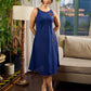 Modern navy dress enhanced by delicate, artistic Kalamkari side-applique work.
