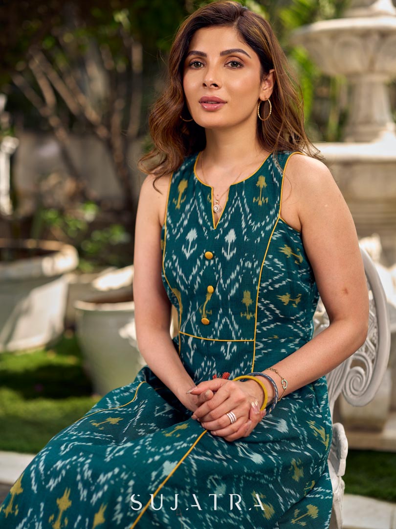 Elegant green and yellow mercerised Ikat dress featuring bold yellow accents and a sculpted-armhole sleeveless silhouette
